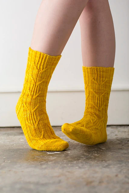 Dawlish- Yellow cabled socks by Rachel Coopey
